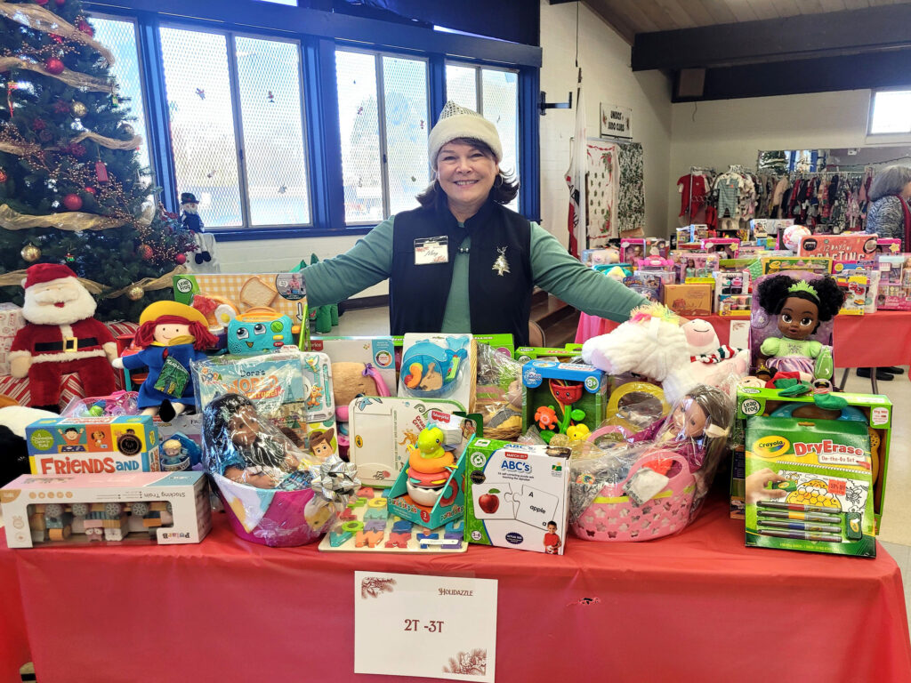 Woman with toys for Christmas event